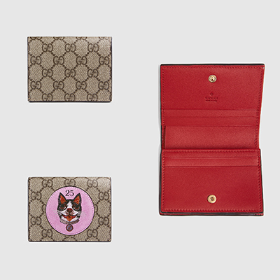 Gucci GG Supreme pouch with Bosco patch